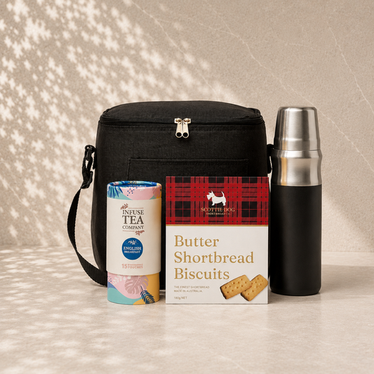 Travel gift set with black cooler bag, Infuse Tea Co. English Breakfast tea, Scottie Dog shortbread biscuits, and 600ml vacuum flask
