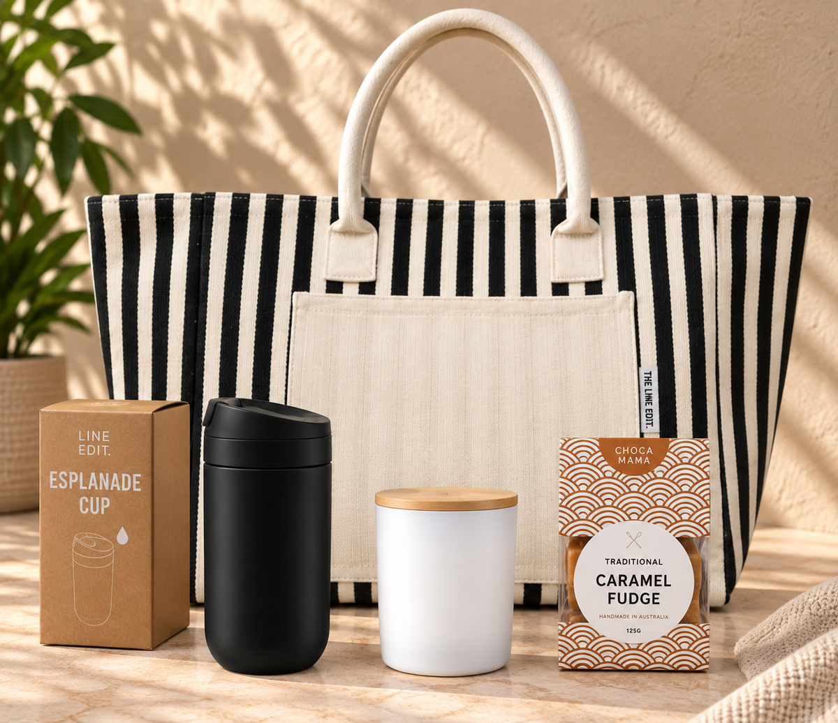For Everything You Do gift with a black striped Hampton tote, black Esplanade cup, soy candle and caramel fudge