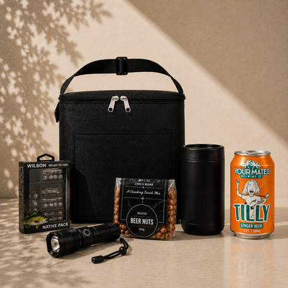 Cast Off fishing gift hamper with Tilly Ginger Beer can, black insulated cooler bag, Wilson tackle kit, rechargeable torch, drink cooler and beer nuts