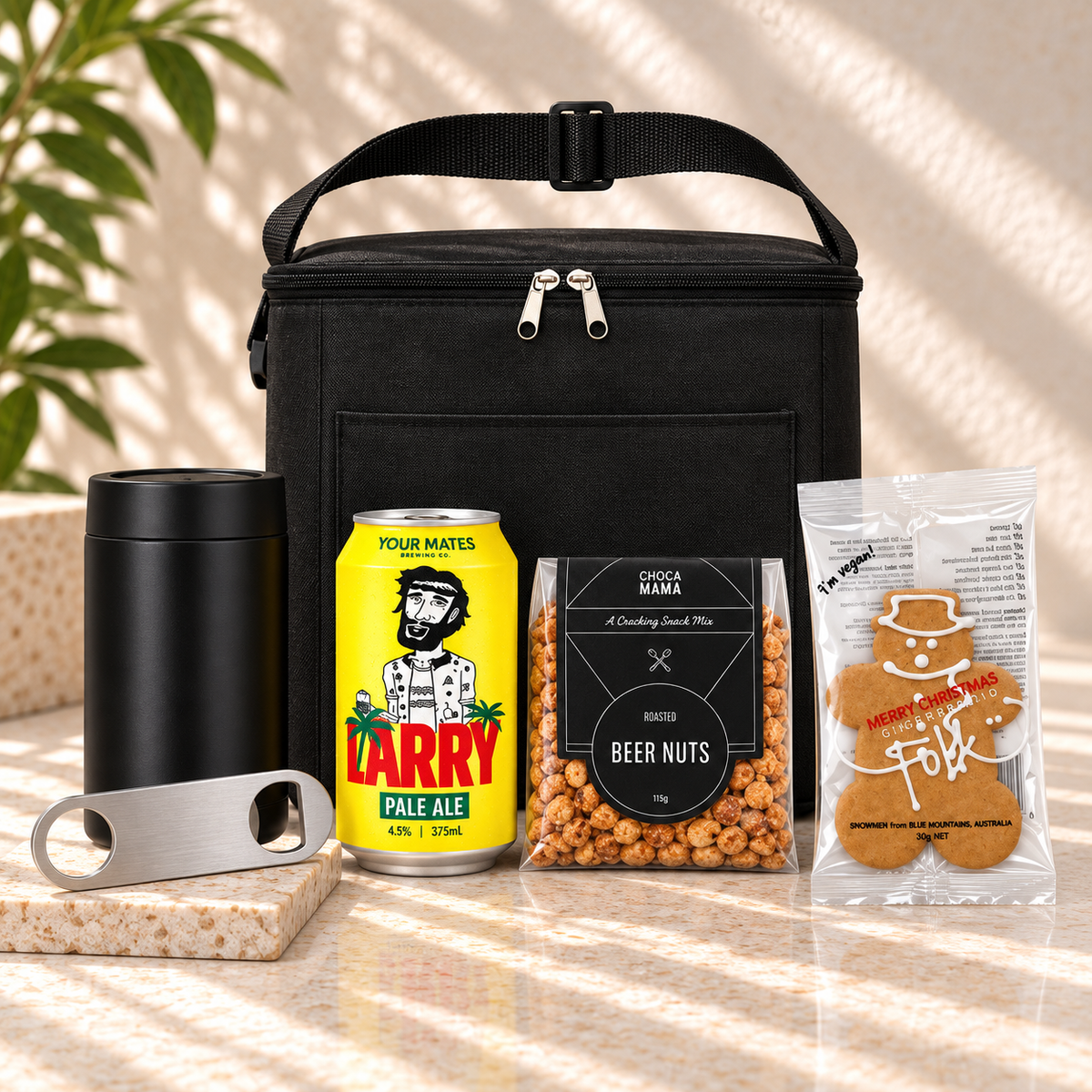 Christmas gift hamper for beer lovers with cooler bag, stainless drink cooler, beer nuts, gingerbread and Larry Pale Ale