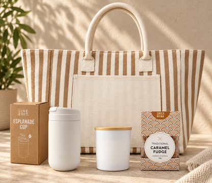 For Everything You Do gift with a natural striped Hampton tote, white Esplanade cup, soy candle and caramel fudge