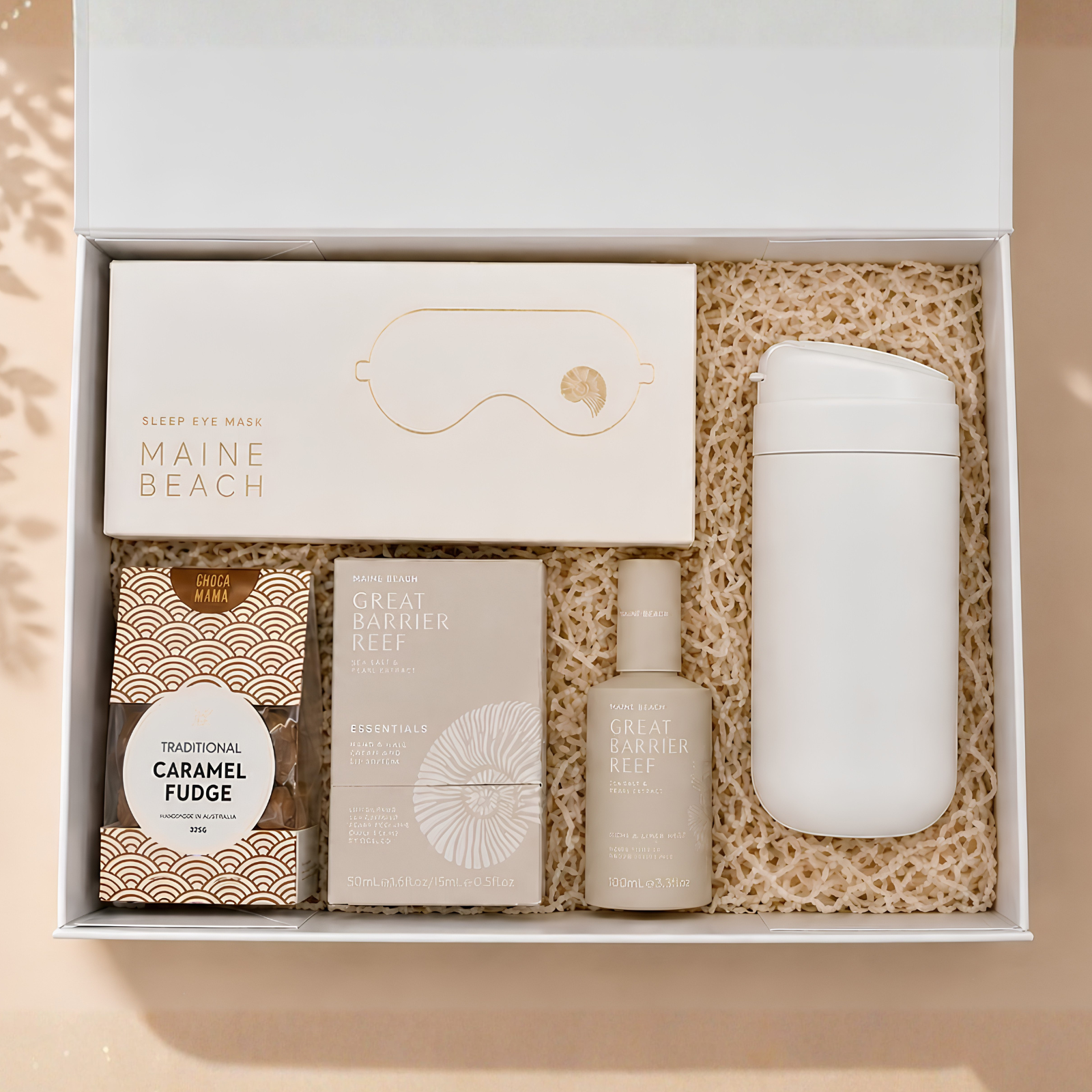 Drift and Restore self care gift hamper, closed white magnetic gift box with vanilla cream paper shred