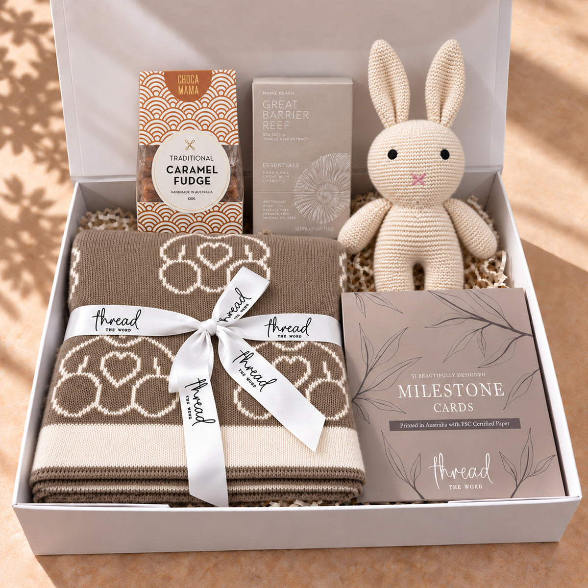 Hello Little One, and You gift hamper in Eggshell, teddy bear blanket, bunny and milestone cards packed in a white gift box