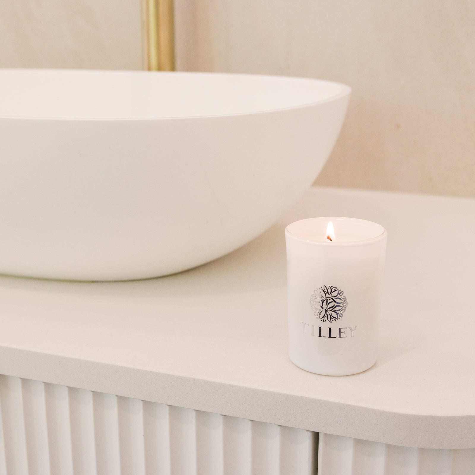 Tilley scented soy candle lit on bathroom vanity – luxury candle gift for her, Sip and Glow pamper evening gift