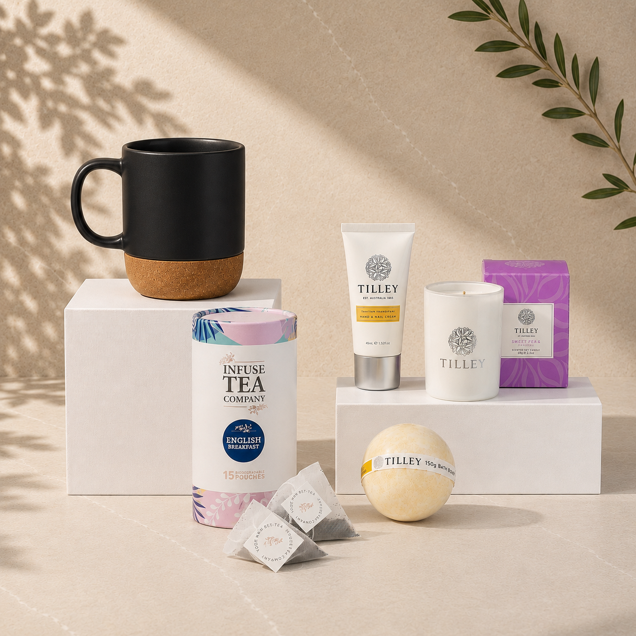 Put the Kettle On self care gift hamper with black cork base mug, English Breakfast tea, Tilley candle, bath bomb and hand cream