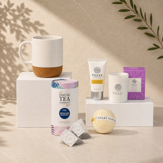 Put the Kettle On self care gift hamper with white cork base mug, English Breakfast tea, Tilley candle, bath bomb and hand cream
