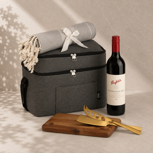 The Long Afternoon gift hamper — grey cooler bag, red wine, wooden serving board, gold cheese knives and Turkish towel