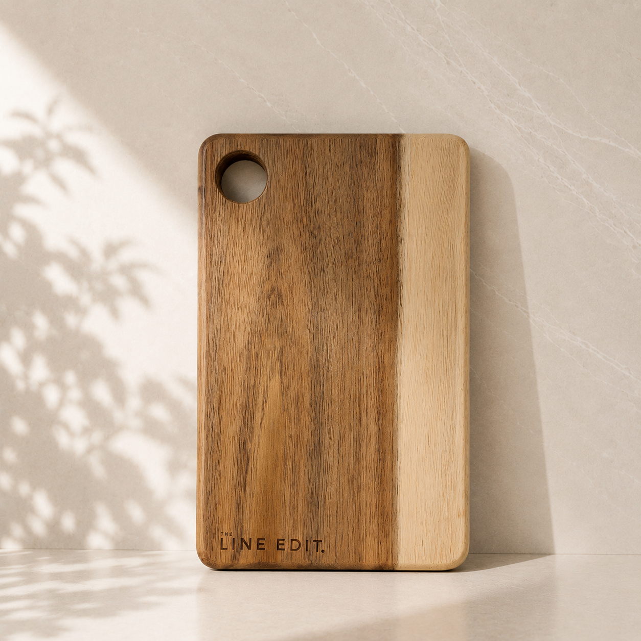 The Line Edit signature wooden serving board — included in A Little Calm at Home relaxation gift hamper by The Gifting Pantry