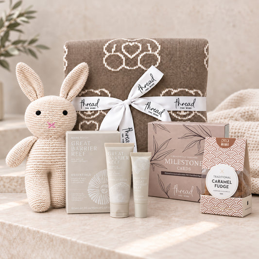 Eggshell baby and new parent gift set, teddy bear blanket, knitted bunny, Maine Beach skincare and caramel fudge