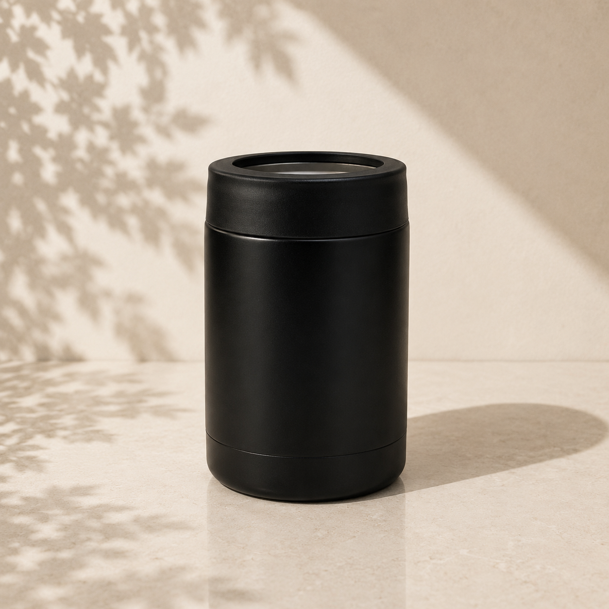 Black stainless steel can cooler for 375ml cans — keeps drinks cold, included in The Backyard Session Father's Day hamper