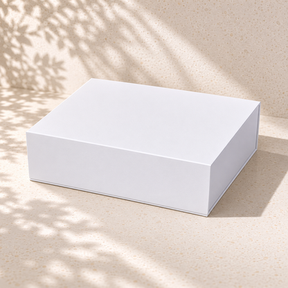 White magnetic-close gift box with vanilla cream paper shred — The Host's Welcome arrives completely gift-ready