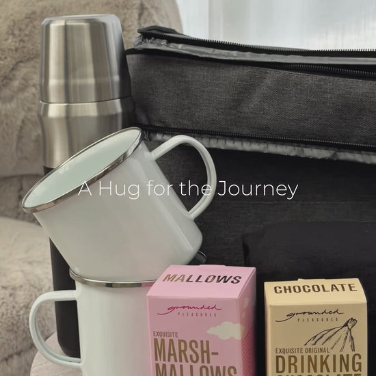 Video showing A Hug for the Journey outdoor adventure gift set – cooler bag, flask, blanket, mugs and hot chocolate