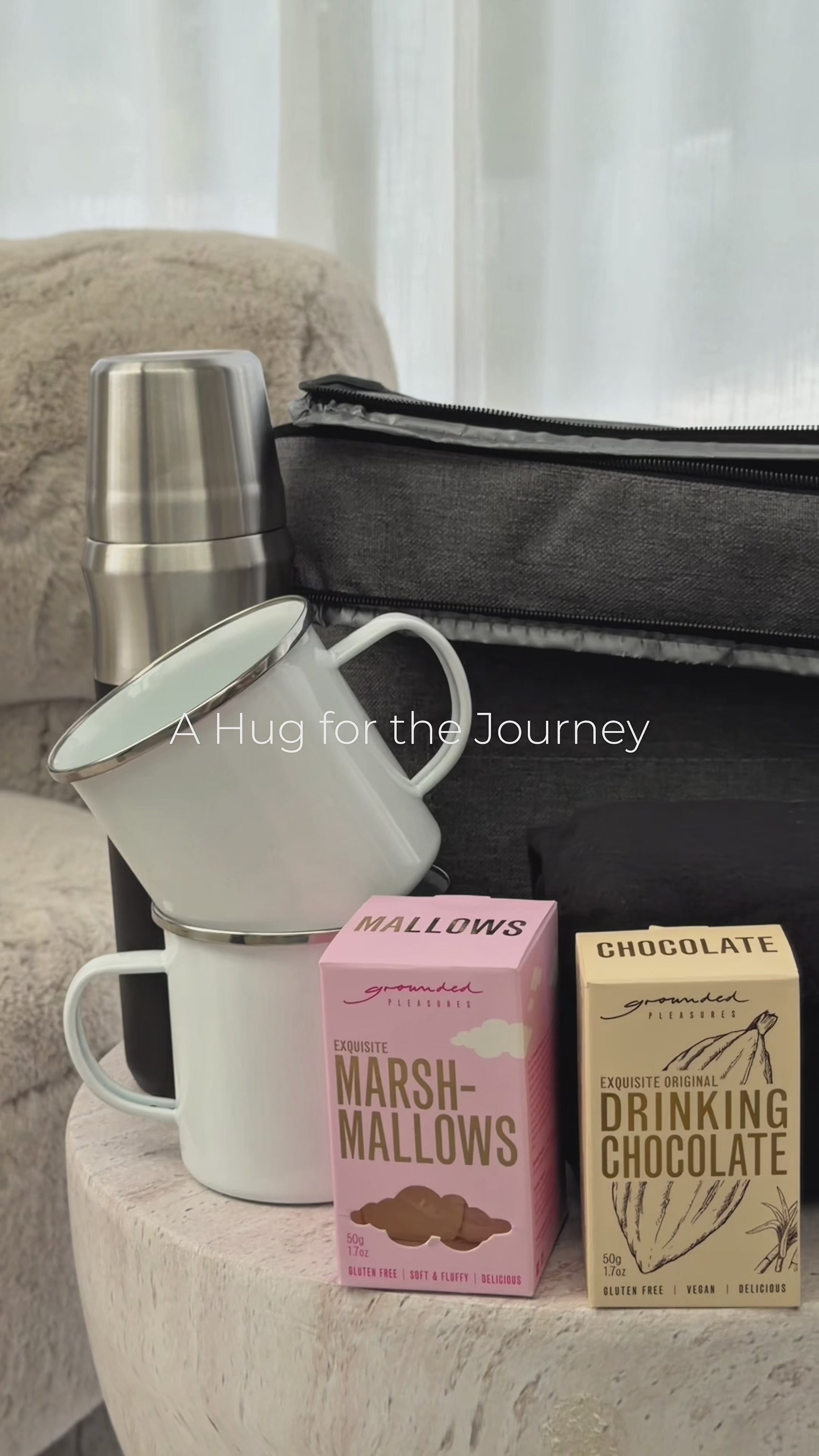 Video showing A Hug for the Journey outdoor adventure gift set – cooler bag, flask, blanket, mugs and hot chocolate