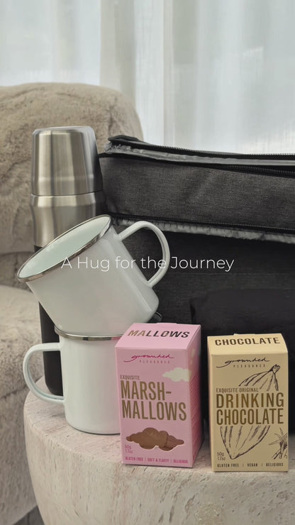 Video showing A Hug for the Journey outdoor adventure gift set – cooler bag, flask, blanket, mugs and hot chocolate