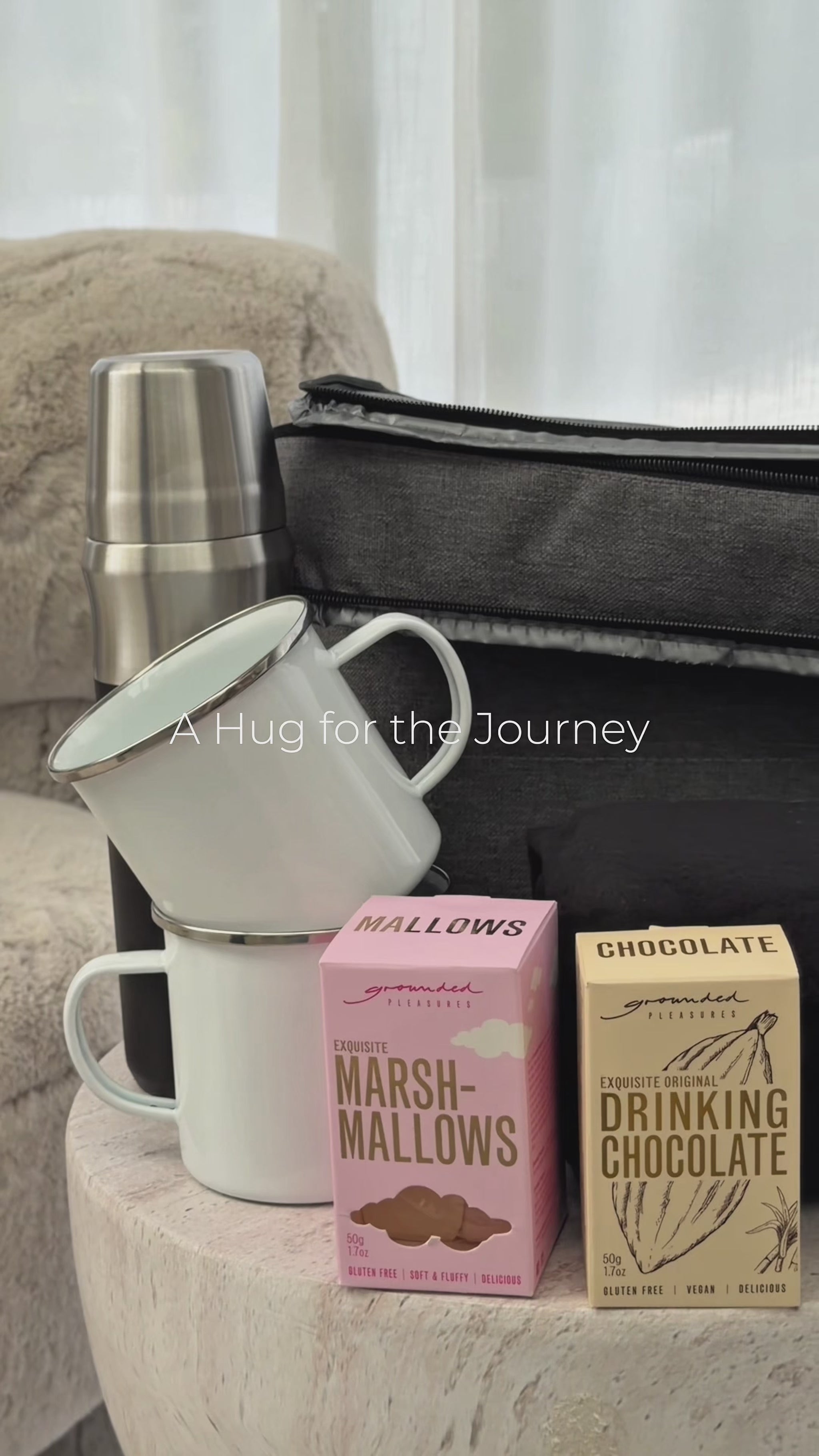 Video showing A Hug for the Journey outdoor adventure gift set – cooler bag, flask, blanket, mugs and hot chocolate