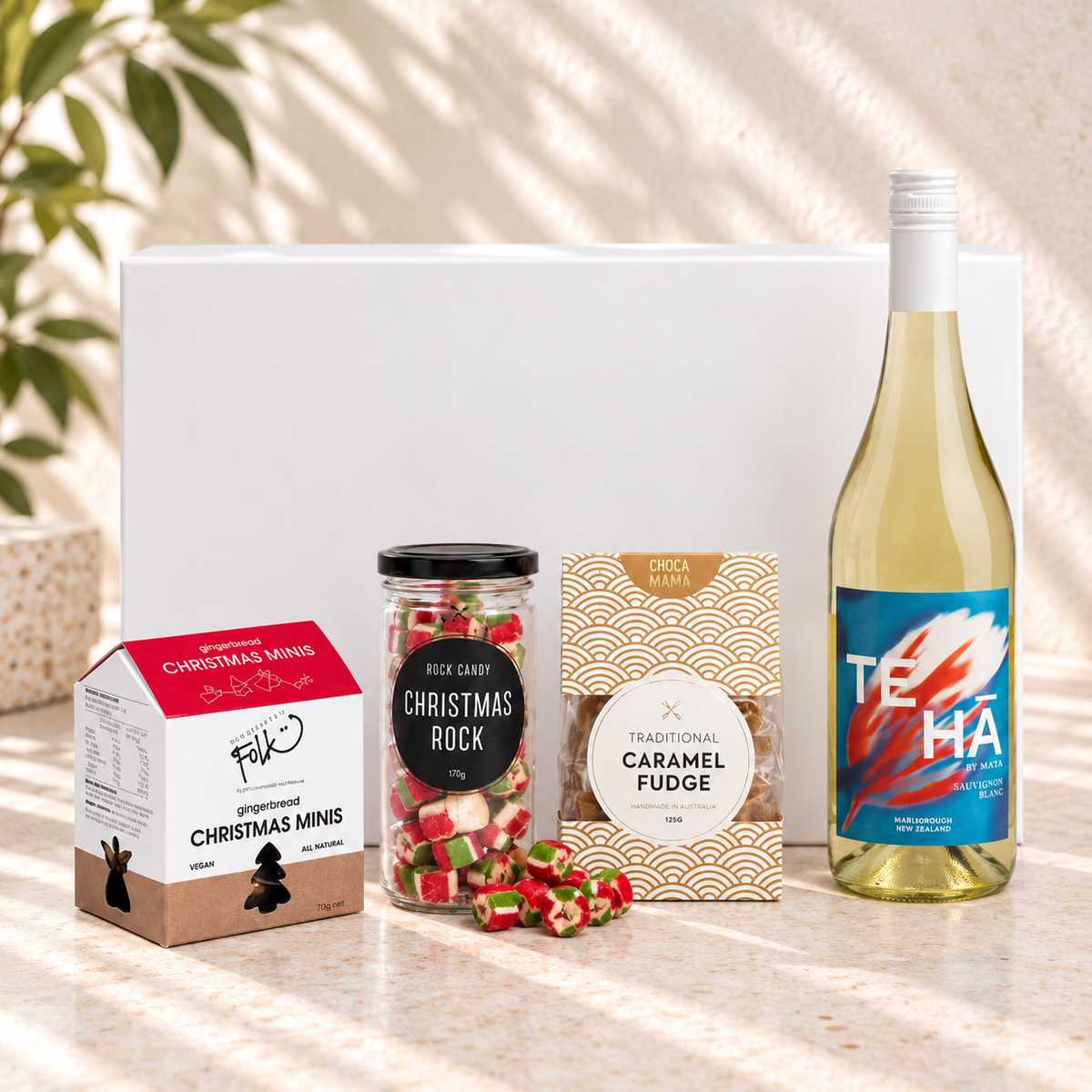 Something for the Season Christmas gift hamper with white wine, Christmas Rock, gingerbread minis and caramel fudge